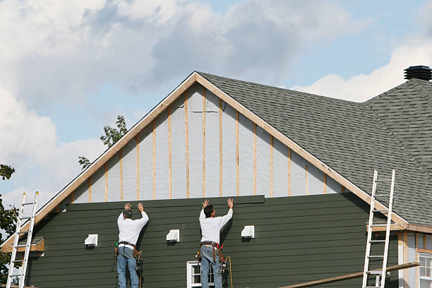 Professional Siding technician working in McGrady, NC